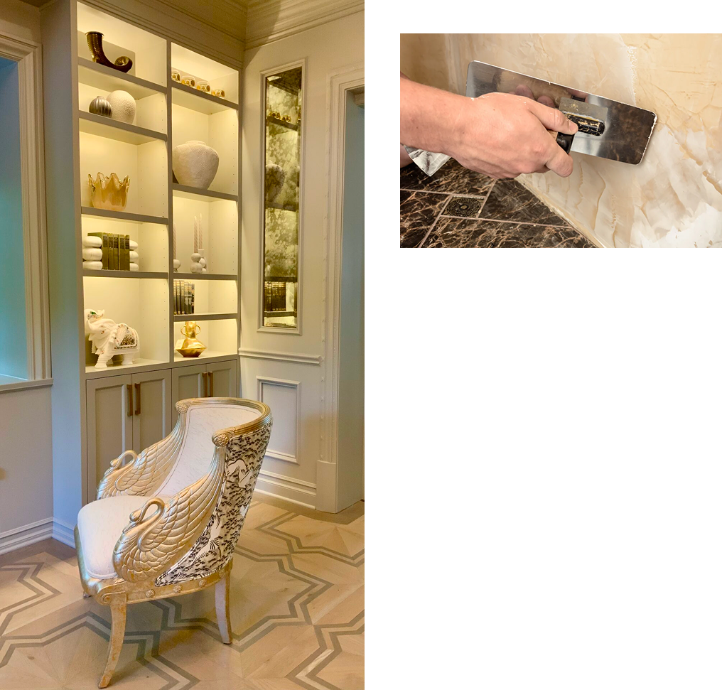 Elegant room with a decorative chair, built-in lit shelves, and an inset of refinishing marble on a wall.