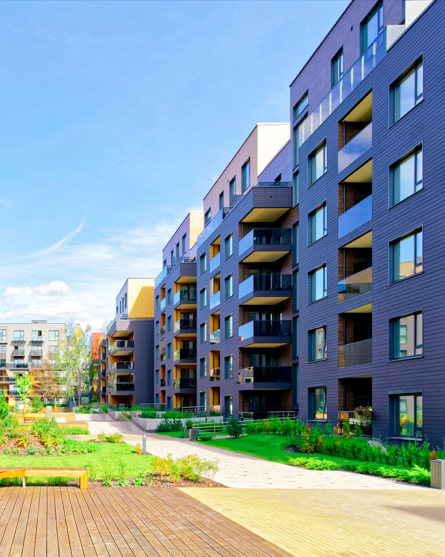 Benches At Modern Architectural Complex Of Residential Buildings Reflex